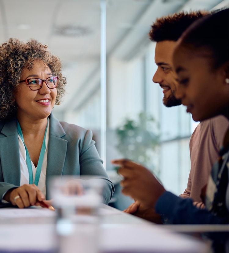 Colleagues having a discussion at a table