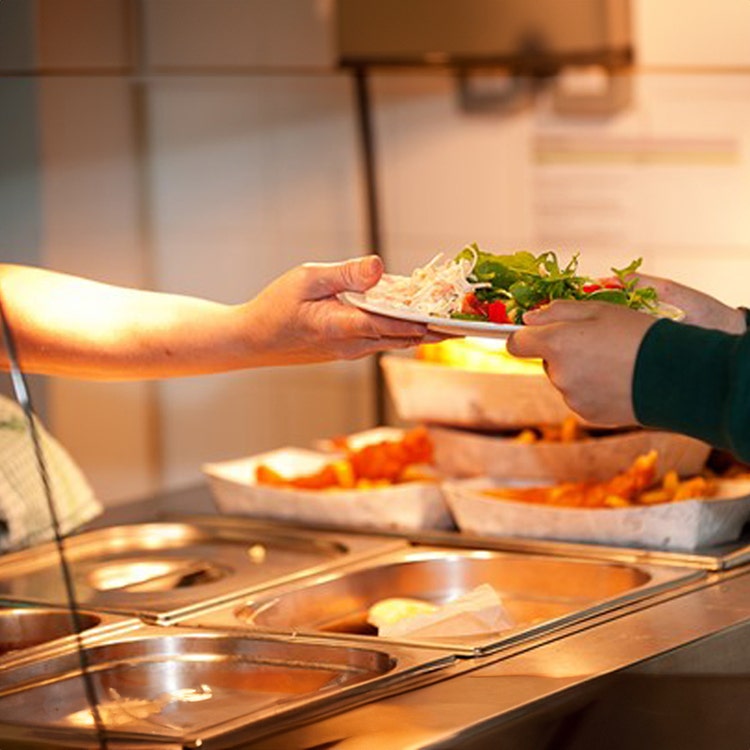 caterer handing over food