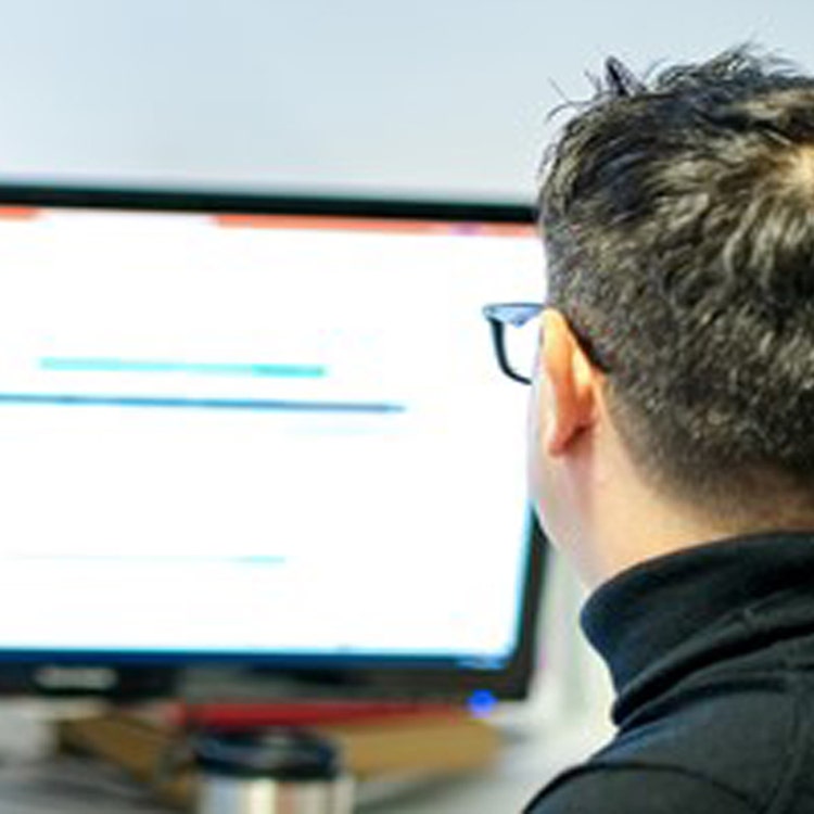 man using a desktop