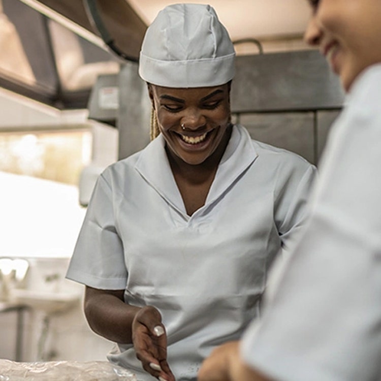 Cheerful chef cooking