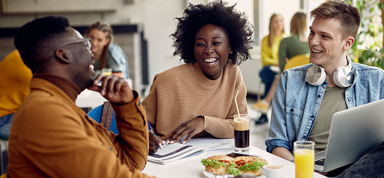 Students meeting in a university or workplace café, representing collaborative foodservice and catering procurement.