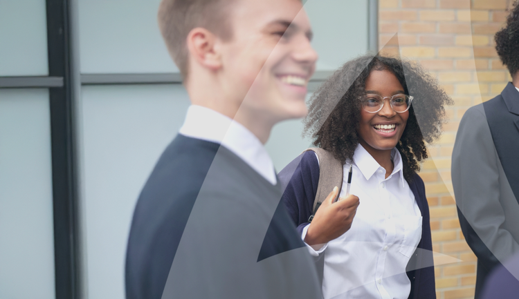 School girl smiling amongst her classmates