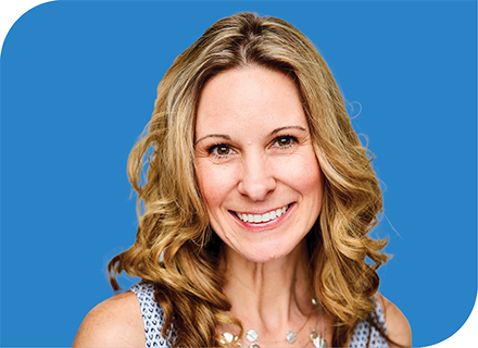 A professional headshot of Heather Altieri with a blue background