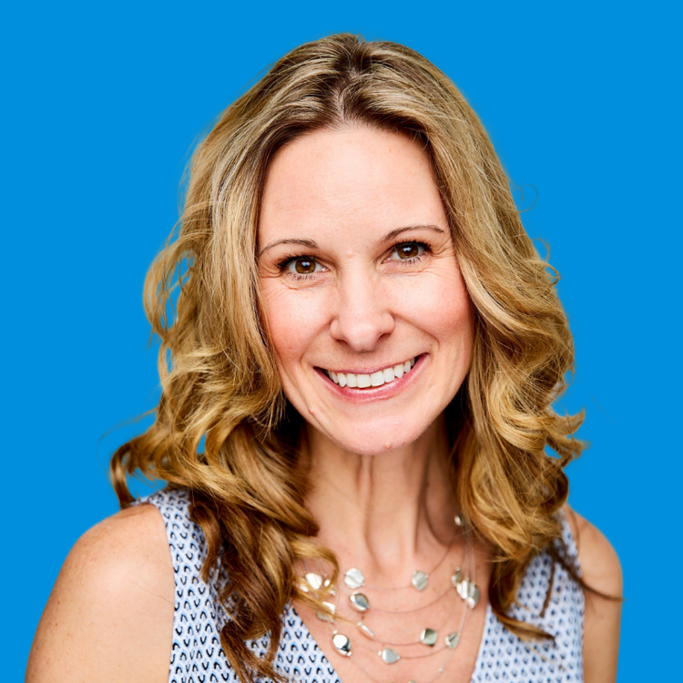 A professional headshot of Heather Altieri with a blue background