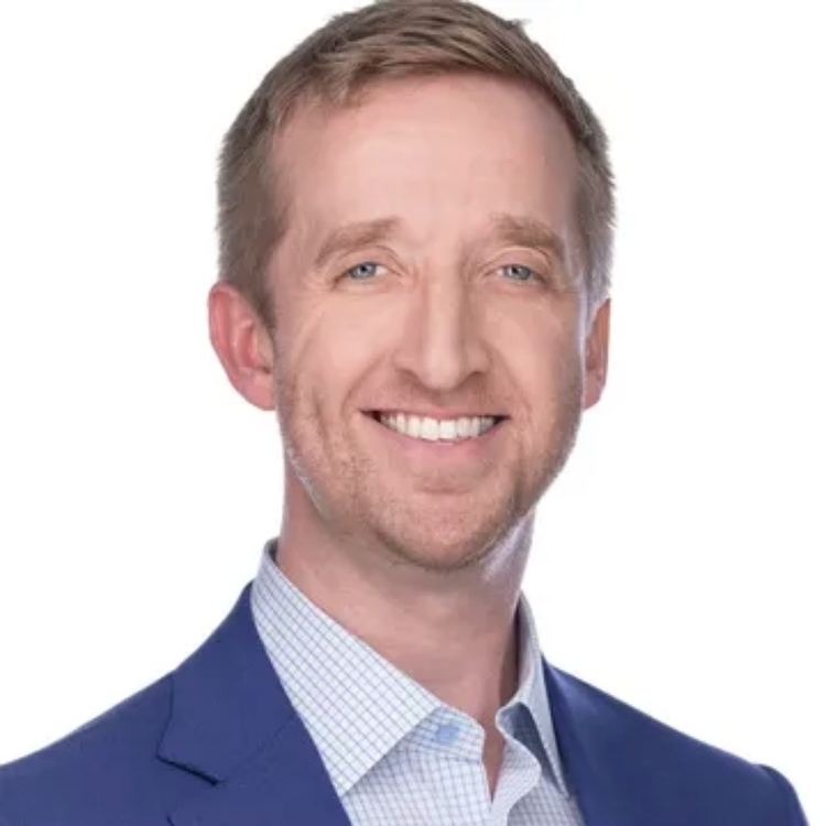 Man smiling in headshot