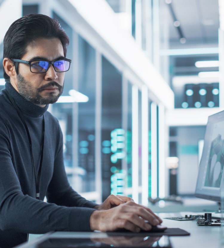 industrial engineer in a modern factory, highlighting Avendra International's commitment to excellence in strategic sourcing and industrial solutions.