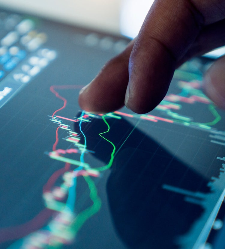 Market analysis with digital monitor - Avendra International's market insights